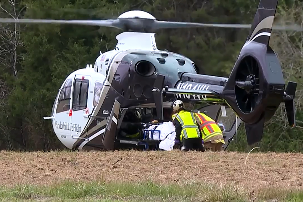 This image taken from video shows emergency responders at the scene of a fatal school bus crash on Friday, March 27, 2026, in Carroll County, Tennessee. (WBBJ-TV via AP)