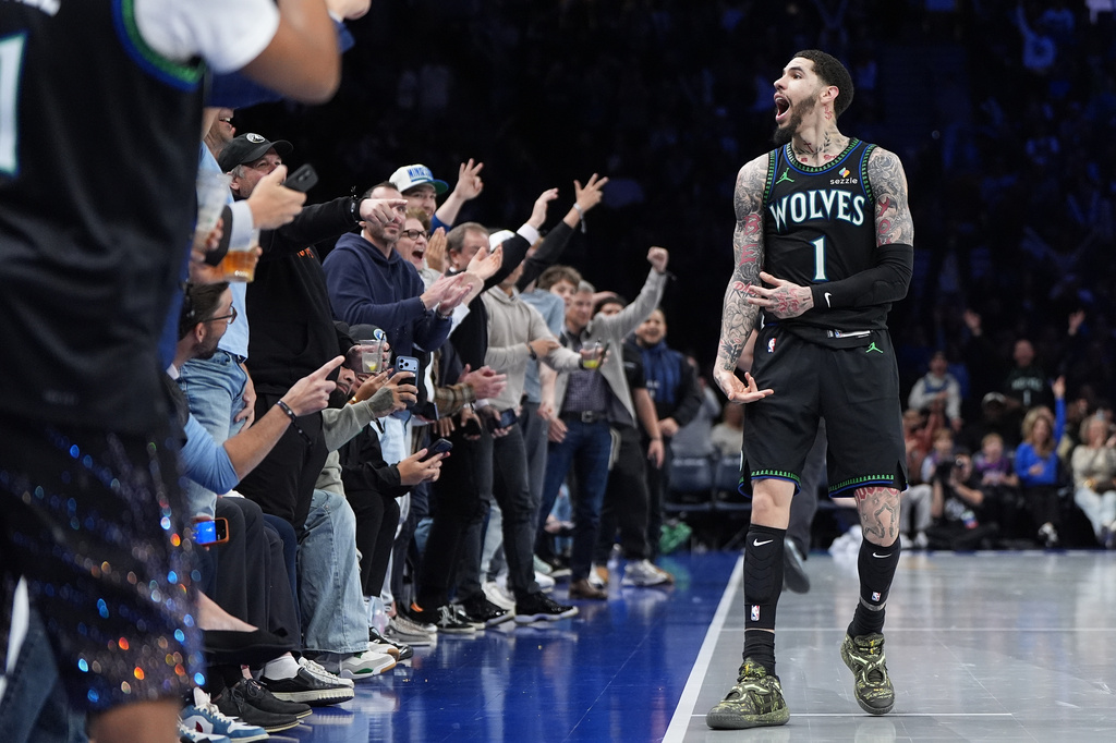 Minnesota Timberwolves guard LaMelo Ball (1) celebrates after making a 3-point basket during the second half of an NBA Cup basketball game against the Los Angeles Clippers, Friday, Oct. 30, 2026, in Minneapolis. (AP Photo/Abbie Parr)