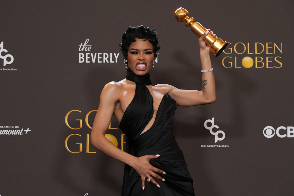 Teyana Taylor poses in the press room with the award for best performance by a female actor in a supporting role in any motion picture for "One Battle After Another" during the 83rd Golden Globes on Sunday, Jan. 11, 2026, at the Beverly Hilton in Beverly Hills, Calif. (AP Photo/Chris Pizzello)