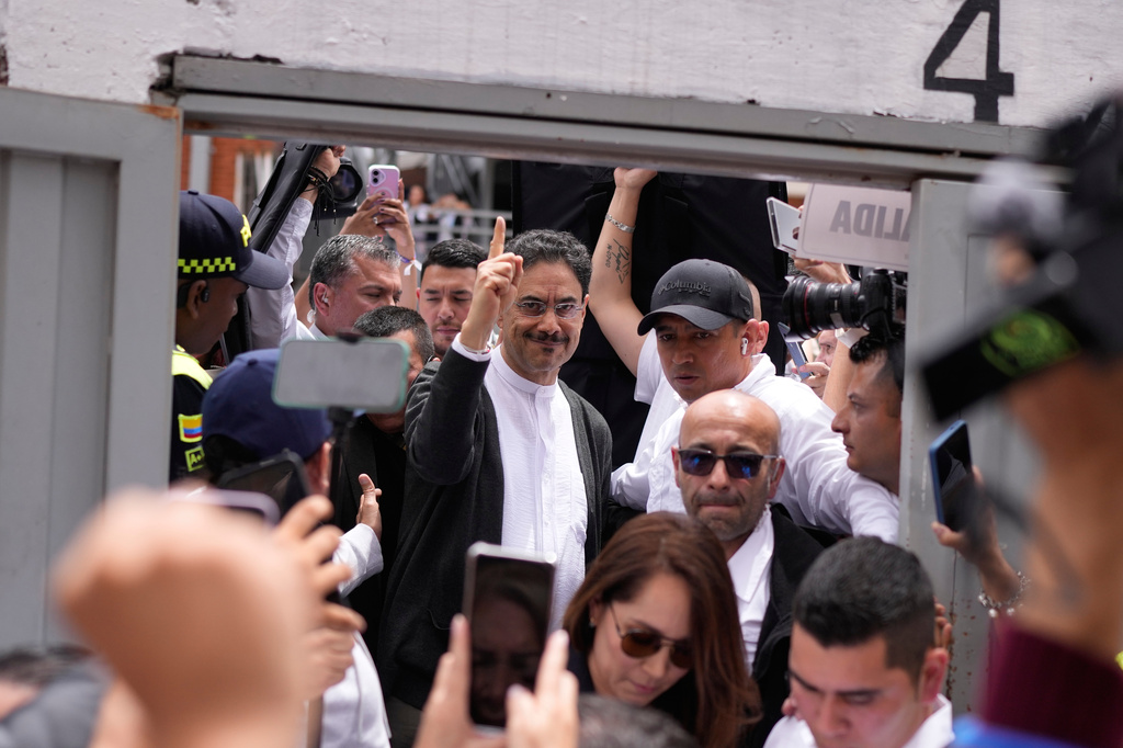 Presidential candidate Ivan Cepeda of the ruling Historic Pact coalition gestures to supporters after voting during the presidential election in Bogota, Colombia, Sunday, May 31, 2026. (AP Photo/Matias Delacroix)