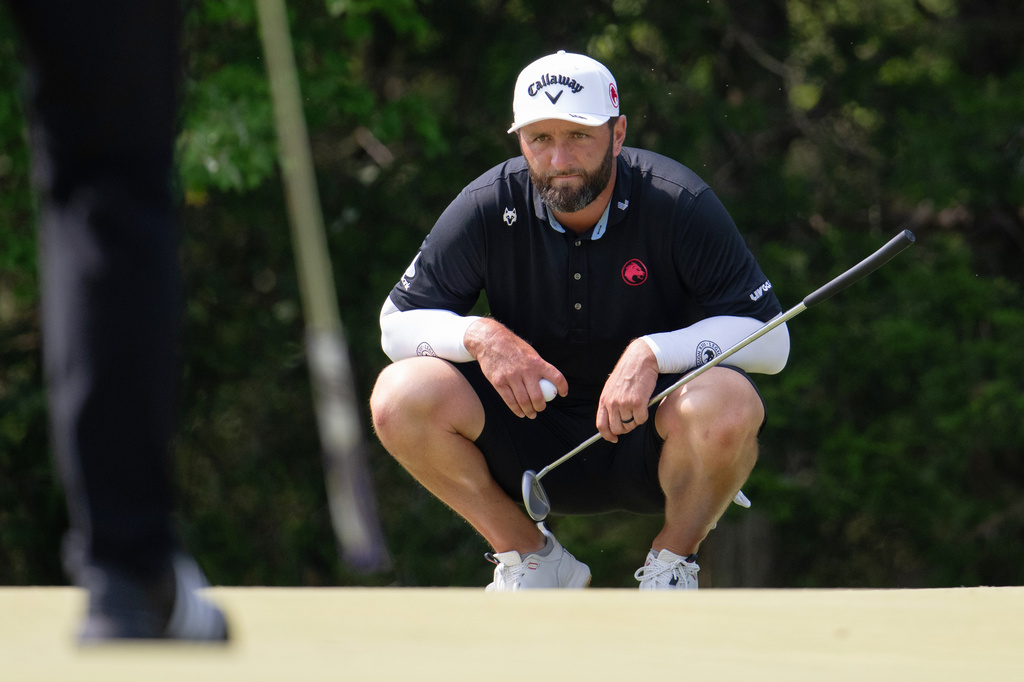 FILE - Captain Jon Rahm of Legion XIII reads his putt during the final round of LIV Golf Bedminster at Trump National Golf Club on Sunday, Aug. 9, 2026 in Bedminster, N.J. (Montana Pritchard/LIV Golf, File)