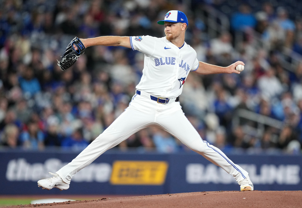 Toronto Blue Jays pitcher Eric Lauer (56) pitches against the Athletics during first inning American League baseball action in Toronto on Sunday, March 29, 2026. (Nathan Denette/The Canadian Press via AP)