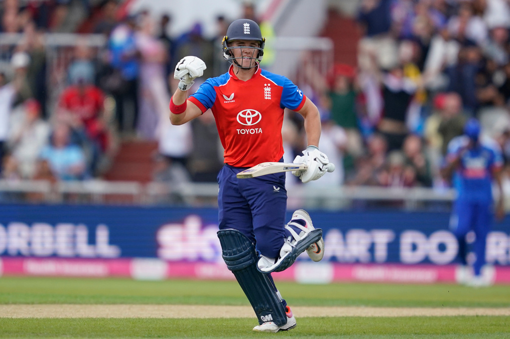England's Jacob Bethell celebrates after winning the second T20 cricket match between England and India in Manchester, England, Saturday, July 4, 2026. (AP Photo/Dave Thompson)