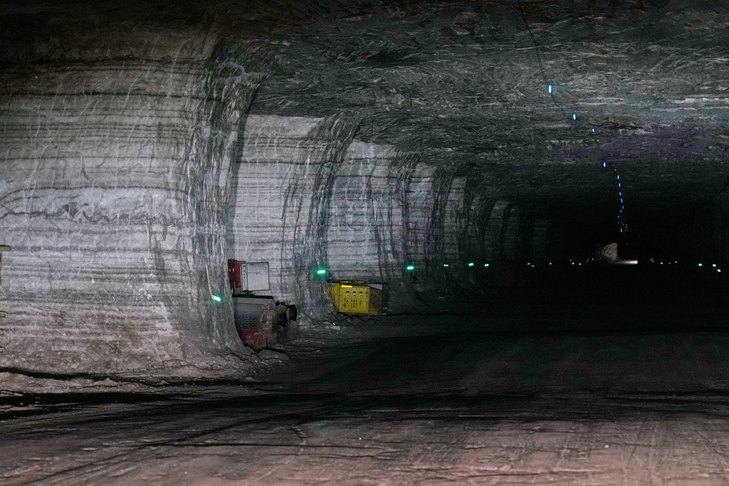 Salt pillars, left behind for support during mining, line the tunnels in the Cargill salt mine in, 1,800 feet below the surface of Lake Erie on Whiskey Island in Cleveland, Ohio, Thursday, March 19, 2026. (AP Photo/Sue Ogrocki)