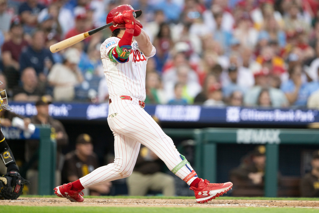 Philadelphia Phillies' Bryce Harper hits a two-run home run during the fourth inning of a baseball game against the San Diego Padres, tying the score, Tuesday, June 2, 2026, in Philadelphia. (Jose F. Moreno/The Philadelphia Inquirer via AP)