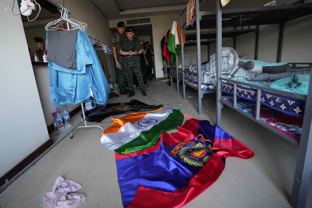 Thai soldiers inspect an abandoned bedroom at a scam center in O'Smach, Cambodia, Monday, Feb. 2, 2026. (AP Photo/Sakchai Lalit)