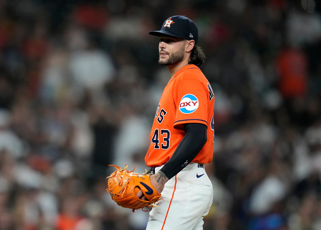 Houston Astros starting pitcher Lance McCullers Jr. reacts after giving up a home run to New York Yankees' Jazz Chisholm Jr. during the fourth inning of a baseball game, Friday, April 24, 2026, in Houston. (AP Photo/ Karen Warren)