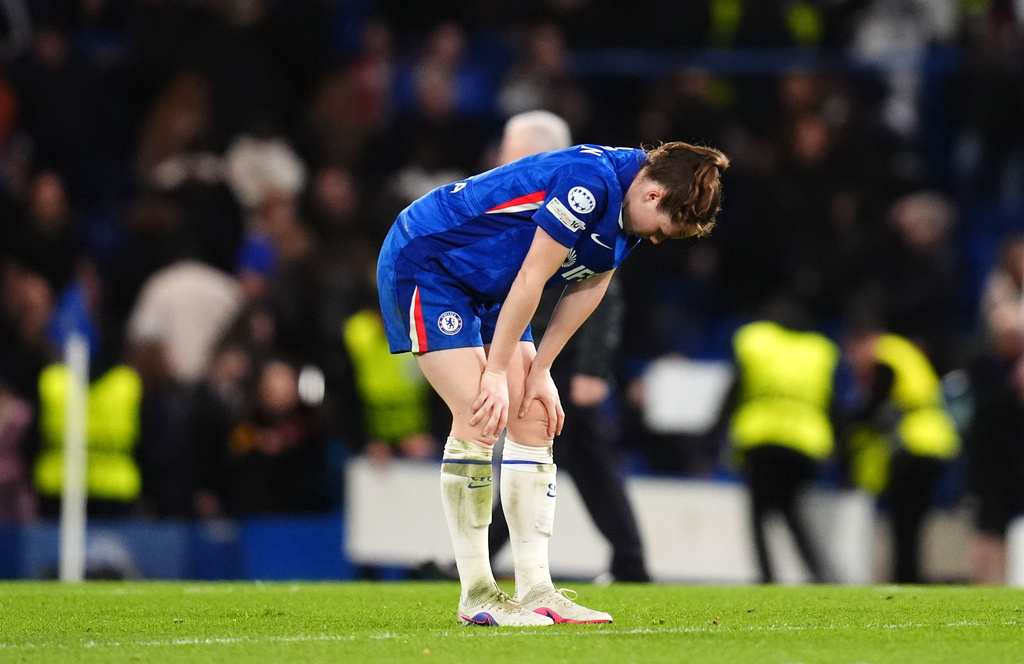 Chelsea's Veerle Buurman reacts following defeat in the Women's Champions League quarterfinal second leg soccer match between Chelsea and Arsenal in London, Wednesday, April 1, 2026. (John Walton/PA via AP)