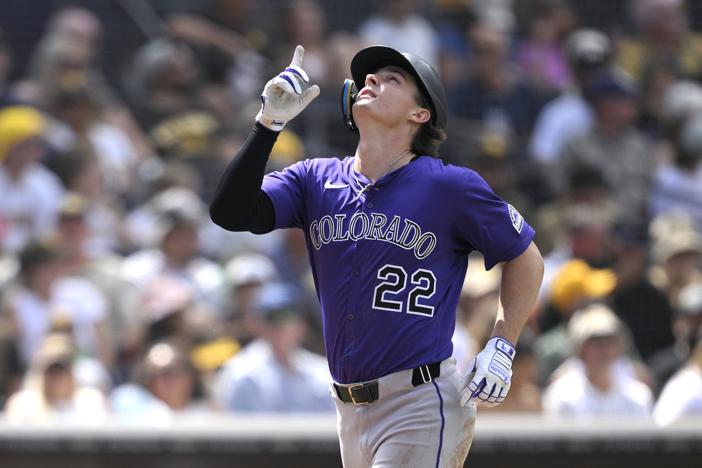Colorado Rockies' Mickey Moniak celebrates after hitting a solo home run against the San Diego Padres during the fourth inning of a baseball game Sunday, Sept. 14, 2025, in San Diego. (AP Photo/Orlando Ramirez)