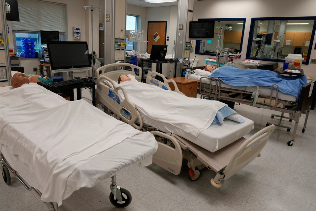 Manikins lay in hospital beds in the simulation lab at Forsyth Technical Community College in Winston-Salem, N.C., Thursday, Aug. 20, 2026. (AP Photo/Chuck Burton)