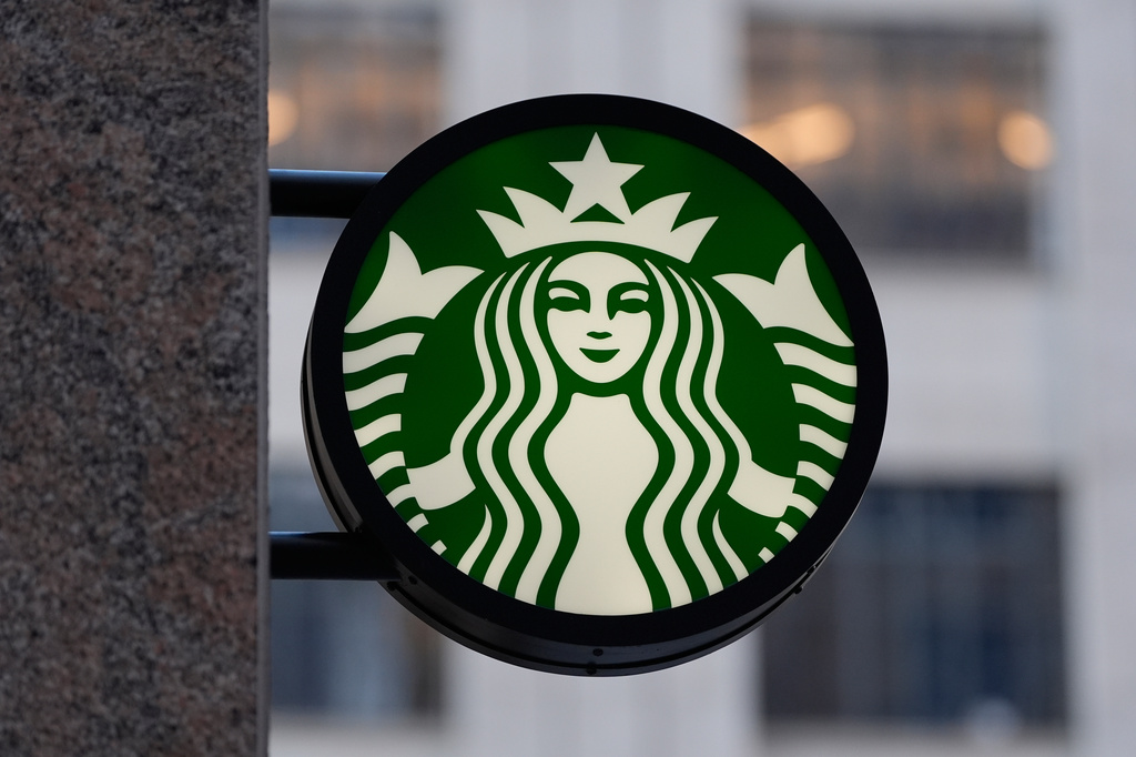 FILE - The Starbucks logo is displayed on a coffee shop, Nov. 24, 2025, in Boston. (AP Photo/Charles Krupa, File)