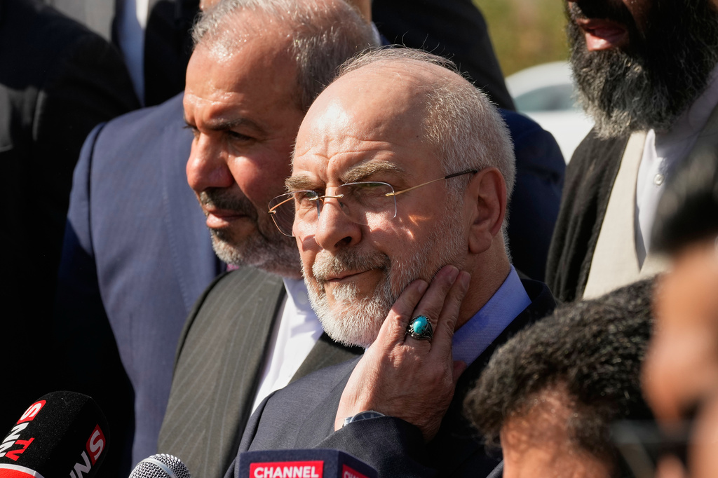 Iranian Parliament Speaker Mohammad Baqer Qalibaf visits the site near Baghdad International Airport where Iranian military commander Qassem Soleimani was killed in a U.S. drone strike, in Baghdad, Iraq, Wednesday, Aug. 19, 2026.(AP Photo/Hadi Mizban)