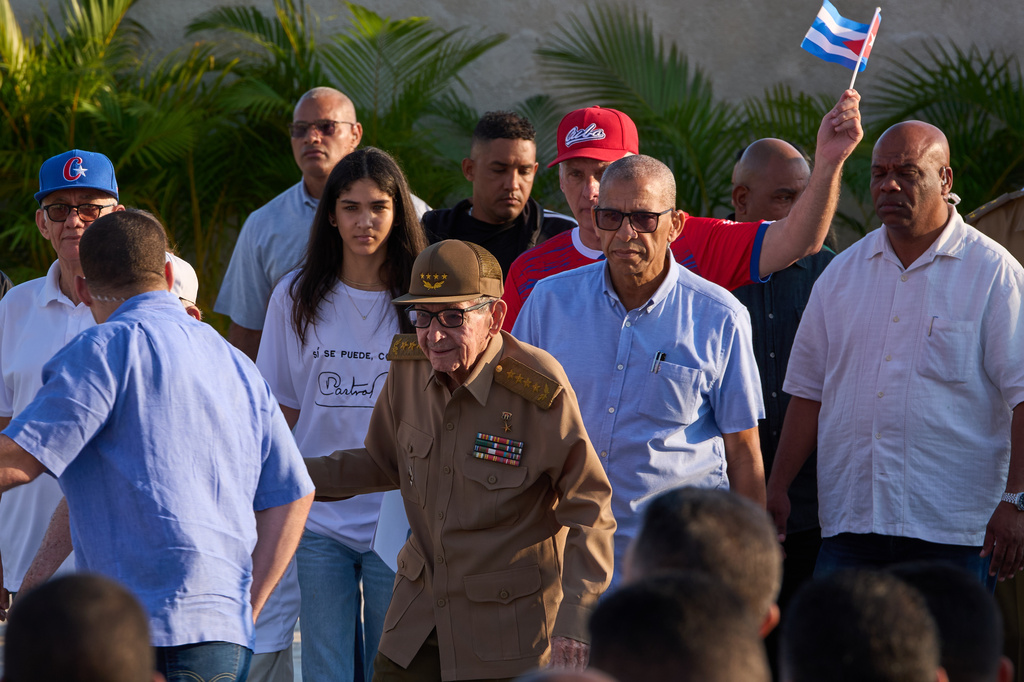 Former President Raul Castro, center, arrives for a gathering marking International Workers' Day at Jose Marti Anti-Imperialist Square in Havana, Cuba, Friday, May 1, 2026. (AP Photo/Ramon Espinosa)