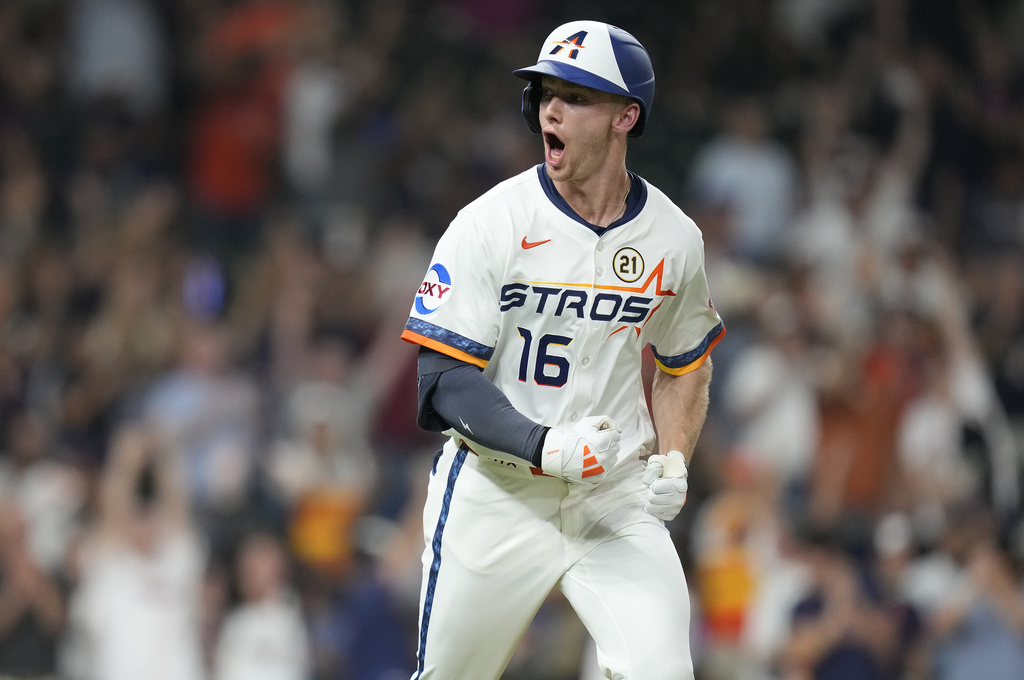 Houston Astros' Zachary Cole reacts after hitting a two-run home run off Texas Rangers starting pitcher Jack Leiter during the fifth inning of a baseball game Monday, Sept. 15, 2025, in Houston. (AP Photo/Karen Warren)