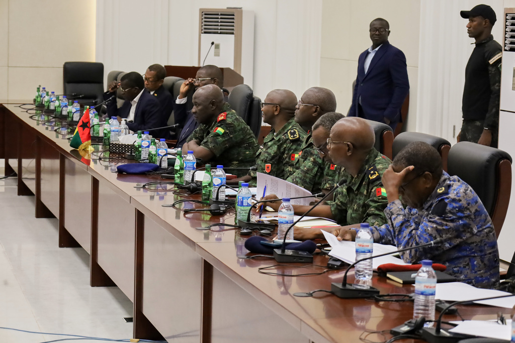 Military officials attend an ECOWAS meeting in Bissau, Guinea-Bissau, Monday, Dec. 1, 2025. (AP Photo/Bubacar Camara)