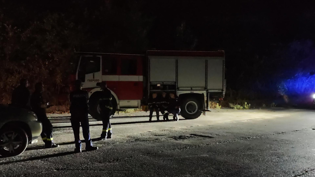 Police and fire department near Tsareva Livada, Bulgaria, Saturday, Sept. 12, 2026 as Bulgarian authorities launched investigations in an explosion at a weapons storage site in central Bulgaria overnight, which came in the wake of another blaze at a munition's depot in the last weeks. (AP Photo/BGNES Agency)