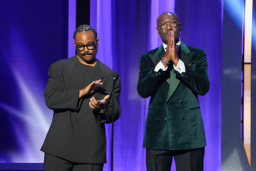 Ryan Coogler, left, and Delroy Lindo present the award for outstanding actress in a motion picture during the 57th NAACP Image Awards on Saturday, Feb. 28, 2026, in Pasadena, Calif. (AP Photo/Chris Pizzello)