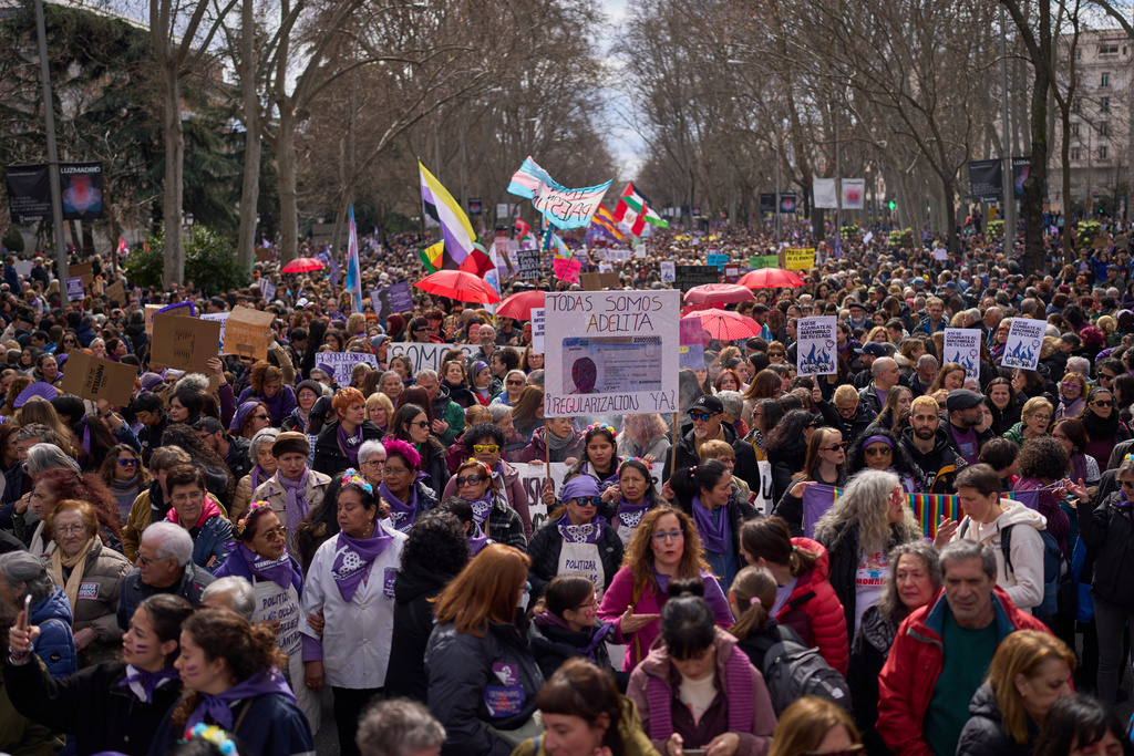 A woman shouts slogans during an International Women's Day protest in Madrid, Spain, Sunday, March 8, 2026. (AP Photo/Manu Fernandez)