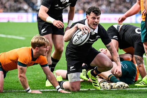 New Zealand's Leroy Carter celebrates after scoring a try during the Bledisloe Rugby test between the All Blacks and the Wallabies at Eden Park in Auckland, New Zealand, Saturday, Sept. 27, 2025. (Andrew Cornaga/Photosport via AP) New Zealand's Leroy Carter celebrates after scoring a try during the Bledisloe Rugby test between the All Blacks and the Wallabies at Eden Park in Auckland, New Zealand, Saturday, Sept. 27, 2025. (Andrew Cornaga/Photosport via AP)