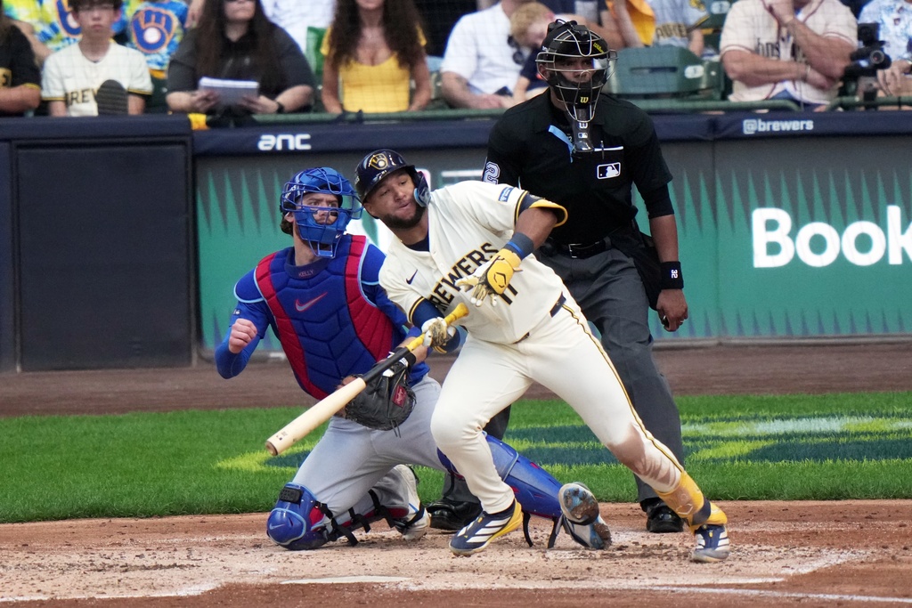 Milwaukee Brewers' Jackson Chourio hits an RBI single during the second inning of Game 1 of baseball's National League Division Series against the Chicago Cubs Saturday, Oct. 4, 2025, in Milwaukee. (AP Photo/Morry Gash)
