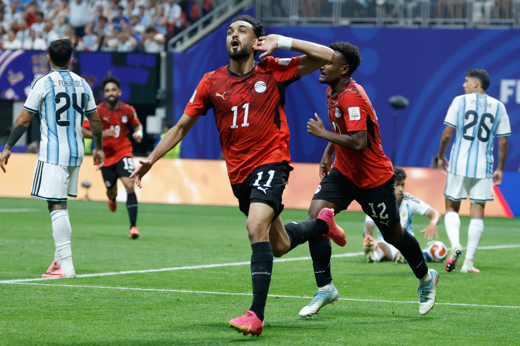 Egypt's Mostafa Zico (11) celebrates scoring their first goal during the World Cup round of 16 soccer match between Argentina and Egypt in Atlanta, Tuesday, July 7, 2026. (AP Photo/Erik S. Lesser)