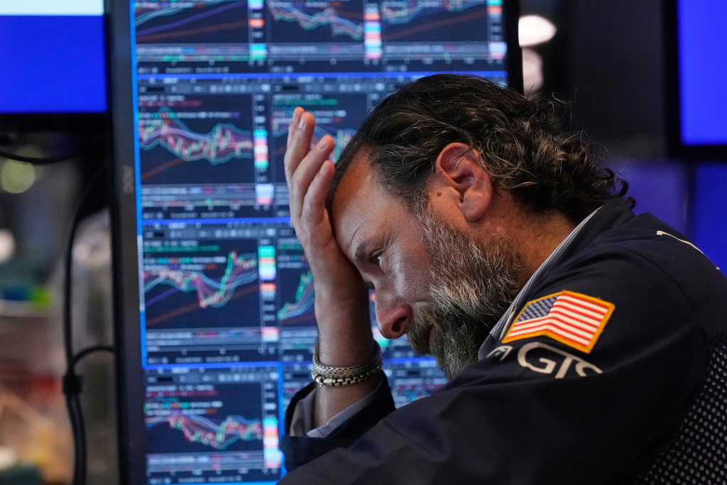 FILE - Specialist Michael Pistillo works on the floor of the New York Stock Exchange, Tuesday, July 8, 2025. (AP Photo/Richard Drew, File)