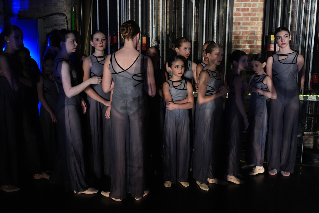 Dancers wait to perform for Ensemble Competition during the Youth America Grand Prix (YAGP) Semi-Finals at Dominican University Performing Arts Center in River Forest, Ill., Sunday, Feb. 8, 2026. (AP Photo/Nam Y. Huh)