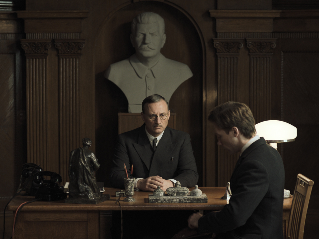 This image released by Janus Films shows Anatoliy Beliy, left, and Alexander Kuznetsov in a scene from "Two Prosecutors." (Janus Films via AP)
