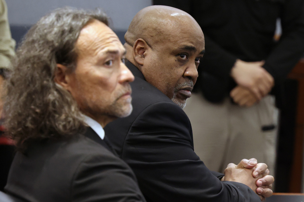 Duane Davis, right, and his attorney Michael Sanft sit in a courtroom after a jury found Davis guilty of first-degree murder in his trial related to the 1996 killing of rapper Tupac Shakur, at Clark County District Court Regional Justice Center, Monday, Aug. 31, 2026, in Las Vegas. (Bizuayehu Tesfaye/Las Vegas Review-Journal via AP, Pool)