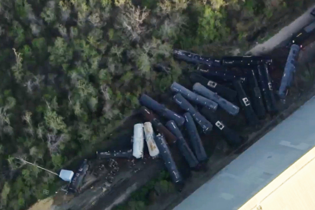 This image made from a video provided by KTRK shows a multiple-car train derailment Wednesday, March 18, 2026, in Richmond, Texas. (KTRK via AP)