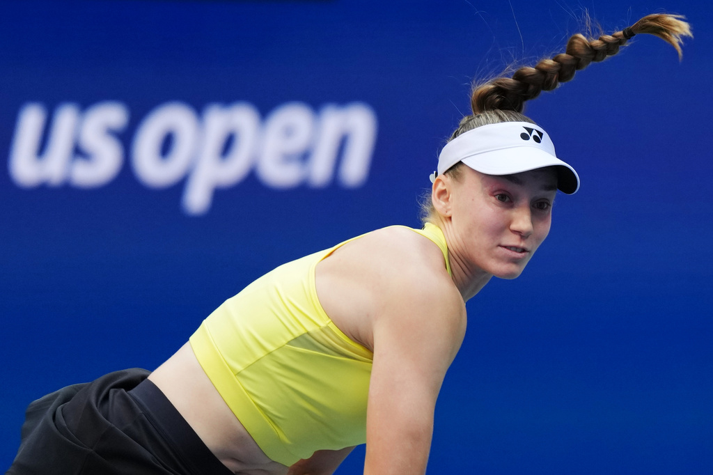 Elena Rybakina, of Kazakhstan, serves the ball to Aryna Sabalenka, of Belarus, during the women's singles final of the U.S. Open tennis championships Saturday, Sept. 12, 2026, in New York. (AP Photo/Kirsty Wigglesworth)