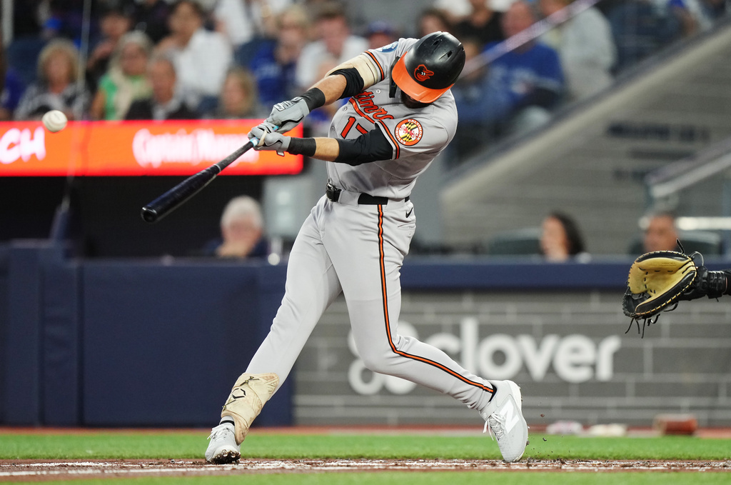 Baltimore Orioles' Colton Cowser hits a two-run double against the Toronto Blue Jays during the second inning of a baseball game in Toronto, Friday, Sept. 11, 2026. (Nathan Denette/The Canadian Press via AP)