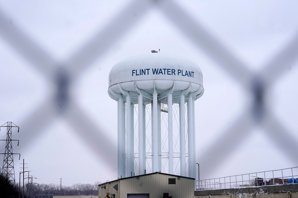 FILE - The Flint water plant tower is seen, Jan. 6, 2022, in Flint, Mich. (AP Photo/Carlos Osorio, File)