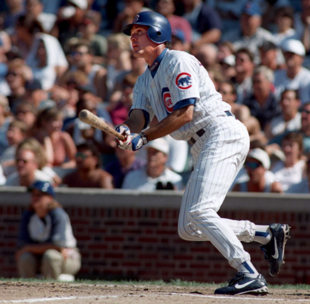 FILE - Chicago Cubs Ryne Sandberg watches his home run ball against the Los Angeles Dodgers in the second inning, Aug. 2, 1997, in Chicago. (AP Photo/Michael Conroy, File)