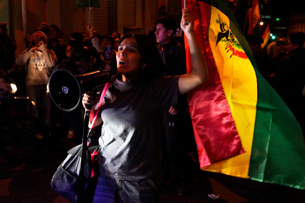 A protester shouts, "It was fraud!" about the results of the day prior's presidential runoff election in La Paz, Bolivia, Monday, Oct. 20, 2025. (AP Photo/Juan Karita)