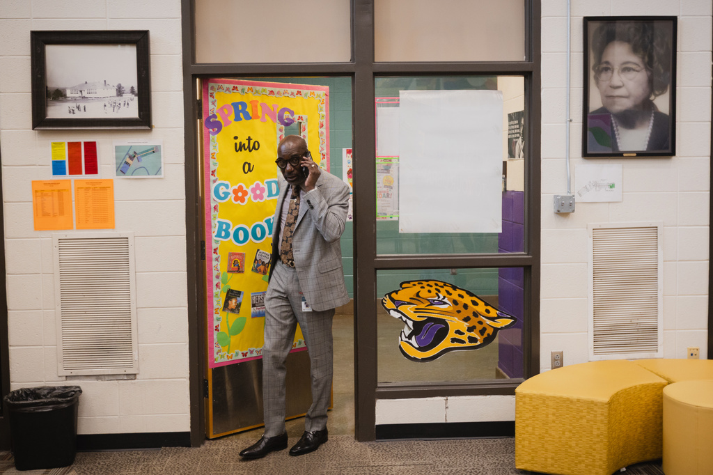 Birmingham City Schools Superintendent, Dr. Mark A. Sullivan, takes a call as he enters the library at Oxmoor Valley Elementary School in Birmingham, Ala., Wednesday, May 6, 2026. (Will McLelland/AL.com via AP)