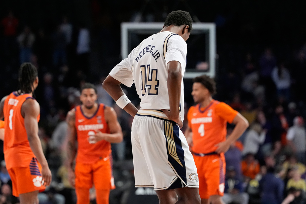 Georgia Tech forward Kowacie Reeves Jr. (14) reacts after a loss during the second half of an NCAA college basketball game against Clemson, Saturday, Jan. 24, 2026, in Atlanta. (AP Photo/Brynn Anderson)