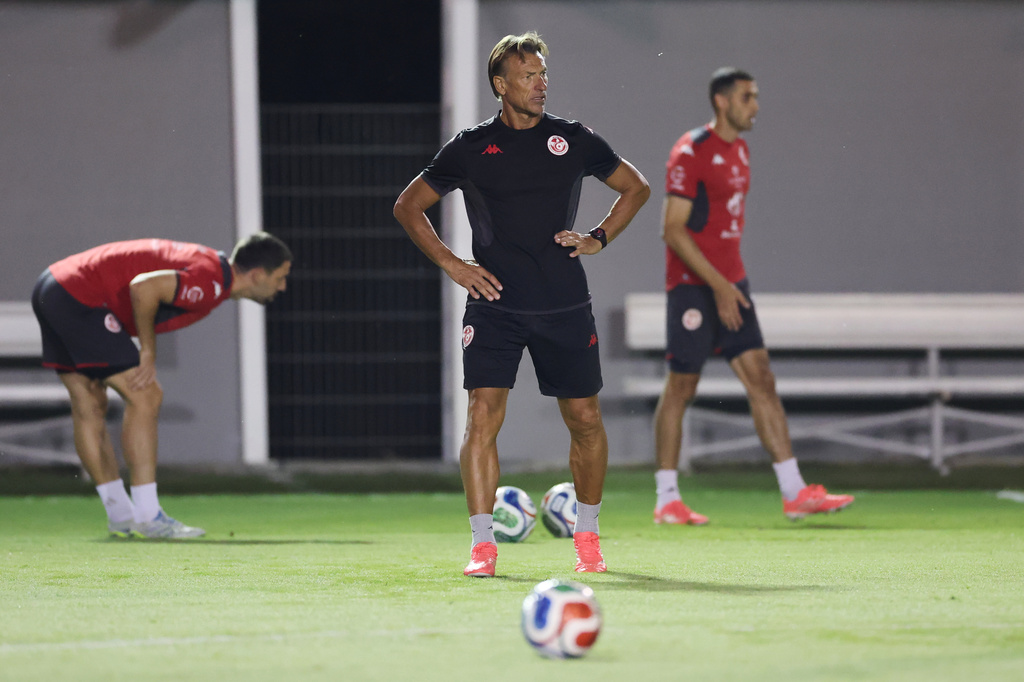 Tunisia's new head coach Hervé Renard watches his players during a World Cup soccer training session, Tuesday, June 16, 2026, in Santiago Nuevo Leon, near Monterrey, Mexico. (AP Photo/Sofia Yaker)