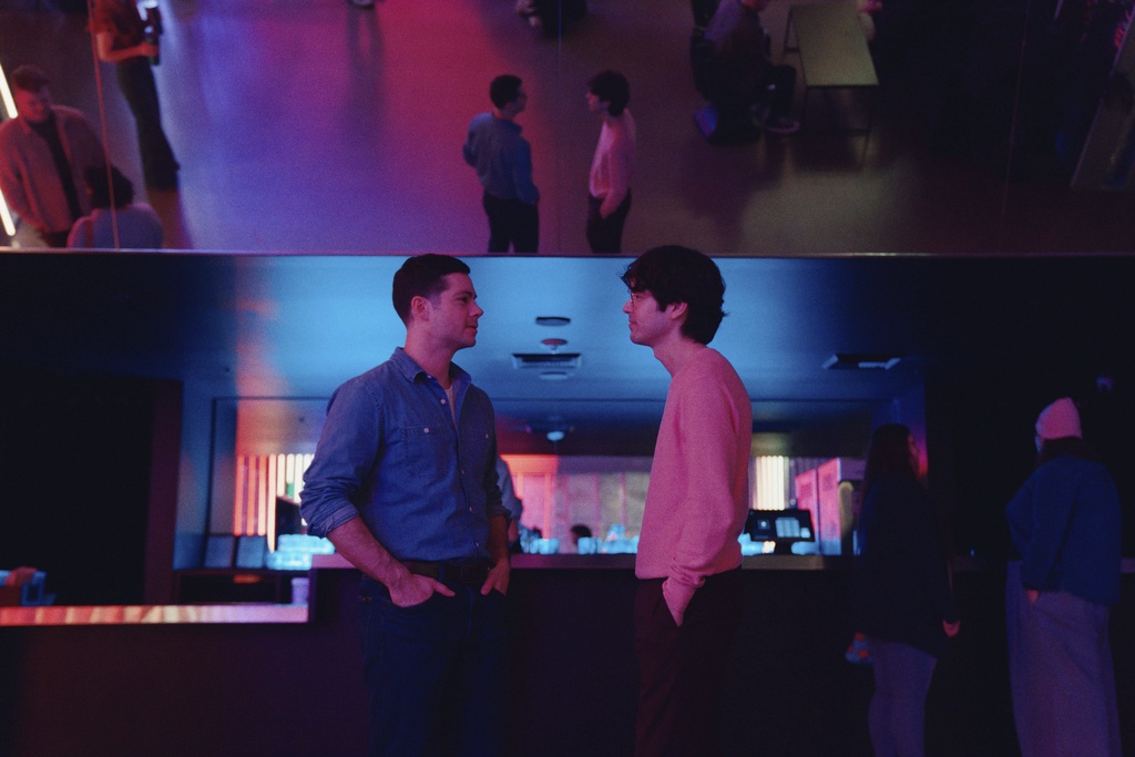 This image released by Roadside Attractions shows Dylan O'Brien, left, and James Sweeney in a scene from "Twinless." (Roadside Attractions via AP)