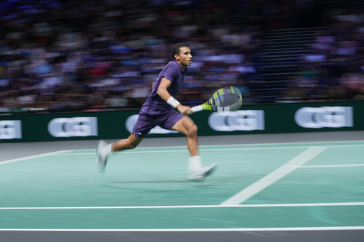 Canada's Felix Auger-Aliassime runs during quarterfinal match of the Paris Masters tennis tournament against Monaco's Valentin Vacherot in Paris, Friday, Oct. 31, 2025. (AP Photo/Christophe Ena) Canada's Felix Auger-Aliassime runs during quarterfinal match of the Paris Masters tennis tournament against Monaco's Valentin Vacherot in Paris, Friday, Oct. 31, 2025. (AP Photo/Christophe Ena)
