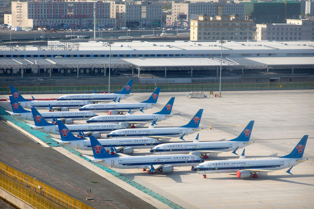 FILE- China Southern Airlines Boeing 737 Max airplanes are parked at the edge of the tarmac at Urumqi Diwopu Interational Airport in Urumqi in western China's Xinjiang Uyghur Autonomous Region, Wednesday, April 21, 2021. (AP Photo/Mark Schiefelbein, File)