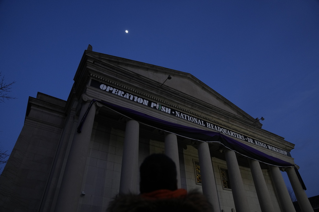 People attend a public visitation for the Rev. Jesse Jackson at Rainbow PUSH Coalition headquarters, Thursday, Feb. 26, 2026, in Chicago. (AP Photo/Erin Hooley)