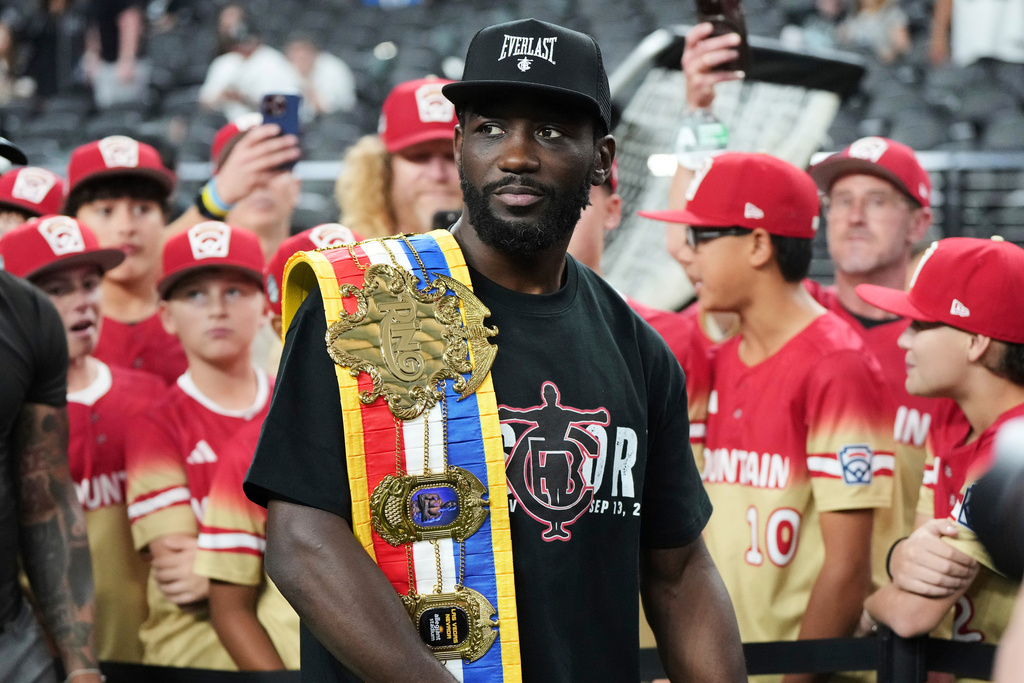 FILE - Boxer Terence Crawford attends the NFL football game between the Las Vegas Raiders and the Los Angeles Chargers, Monday, Sept. 15, 2025, in Las Vegas. (AP Photo/Rick Scuteri, File)