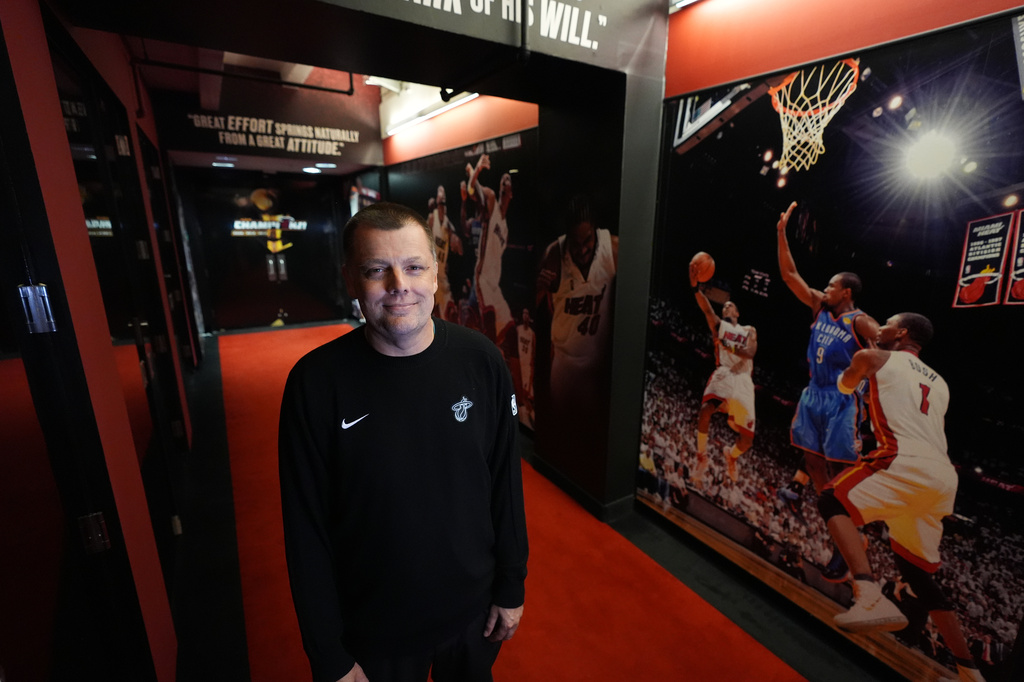 Rob Pimental, Miami Heat's director of team operations, poses for a picture outside his office following an NBA basketball game between the Miami Heat and the Atlanta Hawks, Sunday, April 12, 2026, in Miami. (AP Photo/Rebecca Blackwell)