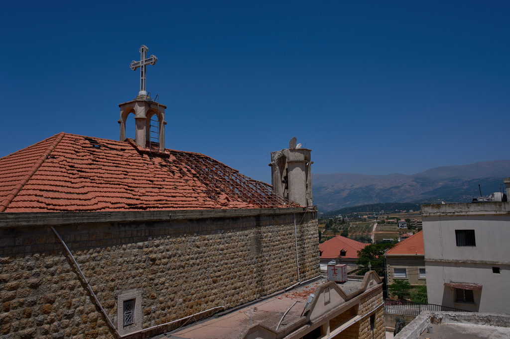 The damaged roof and bell tower of St. George Greek Orthodox Church are seen in the southern town of Jdeitat Marjayoun, Lebanon, Wednesday, June 10, 2026. (AP Photo/Hassan Ammar) CORRECTION: City corrected to Jdeidat Marjayoun, instead of Marjayoun.