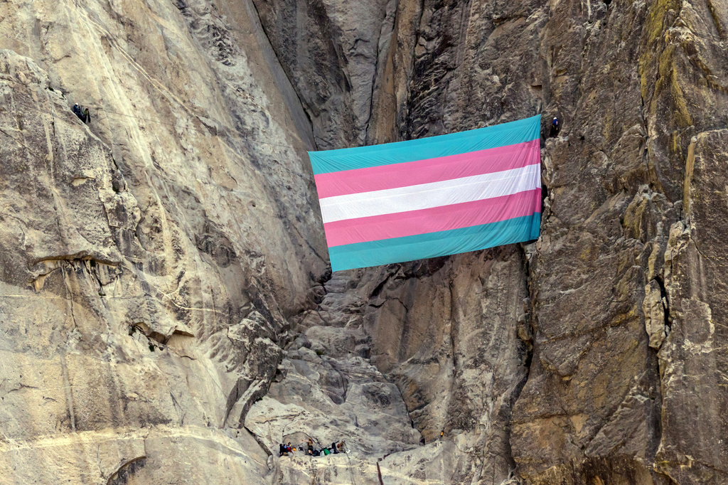 FILE - A group of climbers unfurl a trans pride flag on El Capitan in Yosemite National Park, Calif., on May 20, 2025. (Carlos Avila Gonzalez/San Francisco Chronicle via AP, File)