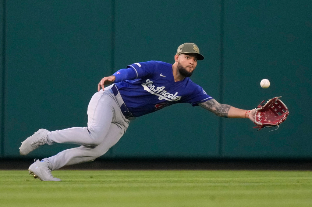 Los Angeles Dodgers center fielder Andy Pages makes a catch on a ball hit by Los Angeles Angels' Nolan Schanuel during the fourth inning of a baseball game Saturday, May 16, 2026, in Anaheim, Calif. (AP Photo/Mark J. Terrill)