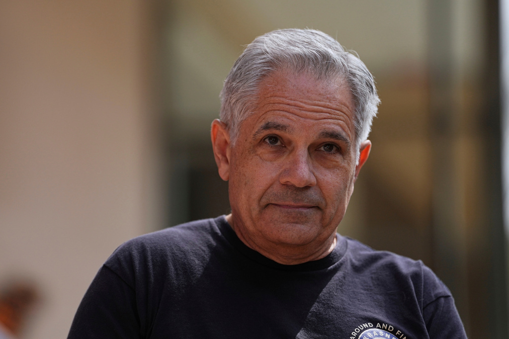 FILE - Philadelphia District Attorney Larry Krasner joins immigrant rights supporters as they demonstrate during a May Day rally outside the federal courthouse in Philadelphia, May 1, 2025. (AP Photo/Matt Rourke, File)