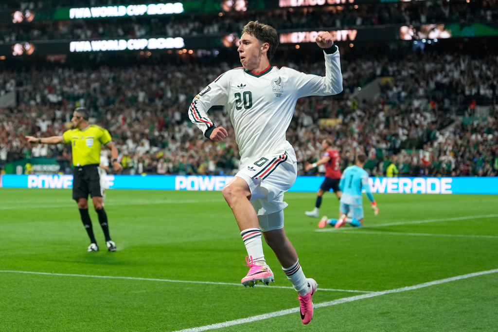 Mexico's Mateo Chavez celebrates scoring the opening goal during a World Cup Group A soccer match between Mexico and Czechia in Mexico City, Wednesday, June 24, 2026. (AP Photo/Silvia Izquierdo)