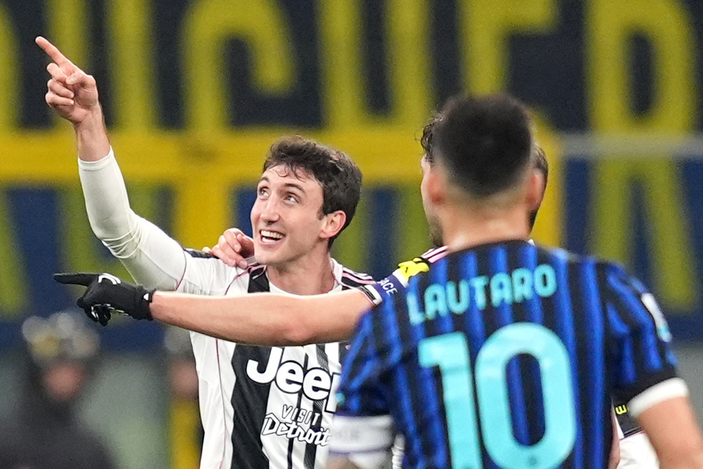 Juventus' Andrea Cambiaso celebrates after scoring his side's first goal during the Serie A soccer match between Inter and Juventus in Milan, Italy, Saturday, Feb. 14, 2025. (Spada/LaPresse via AP)